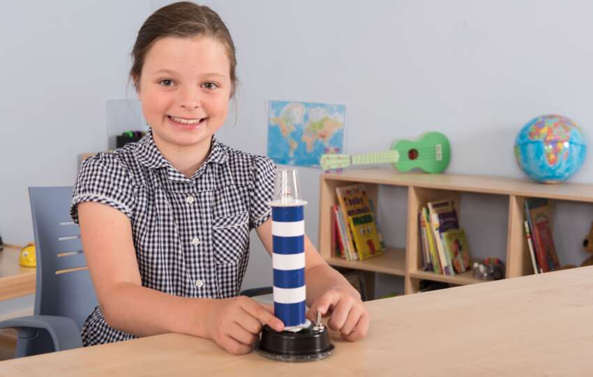 Girl holding science experiment